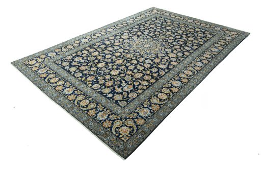 Corner detail of 2000s Kashan rug showing border pattern and Wool pile