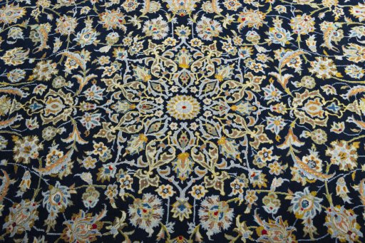 Central medallion detail of 2000s Kashan rug from Iran / Persia