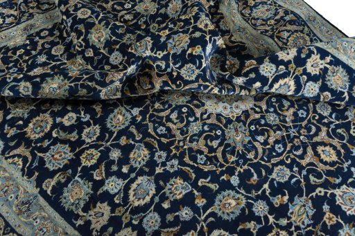 Surface texture of 2000s Kashan rug with natural Wool and intricate pattern
