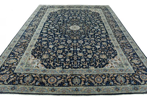 Surface texture of 2000s Kashan rug with natural Wool and intricate pattern