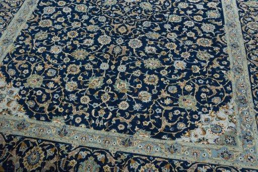 Close-up detail of 2000s Kashan rug from Iran / Persia showing Wool weave