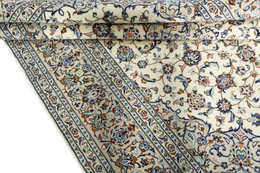 Close-up detail of 2000s Kashan rug from Iran / Persia showing Cork weave