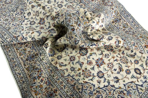 Surface texture of 2000s Kashan rug with natural Cork and intricate pattern