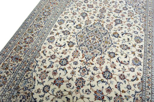 Backside of handmade 2000s Kashan rug showing knot structure and weave density