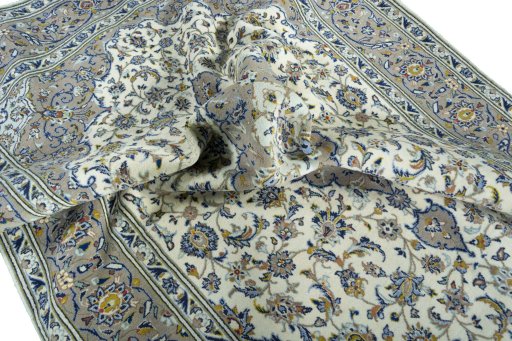 Surface texture of 2000s Kashan rug with natural Wool and intricate pattern