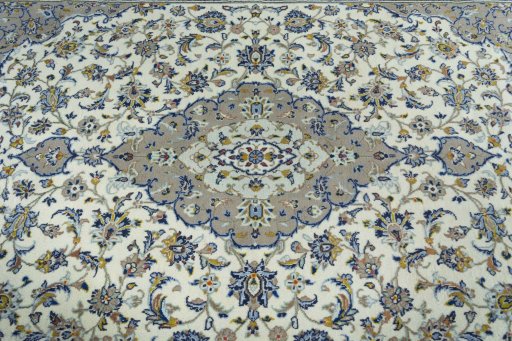 Central medallion detail of 2000s Kashan rug from Iran / Persia