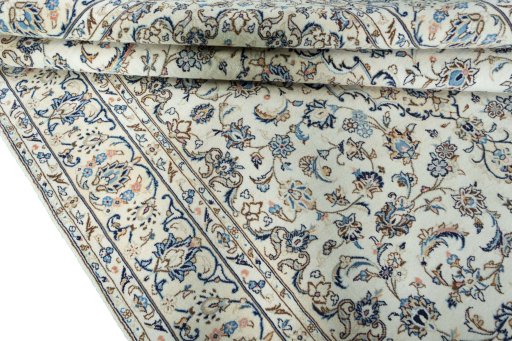 Close-up detail of 2000s Kashan rug from Iran / Persia showing Wool weave