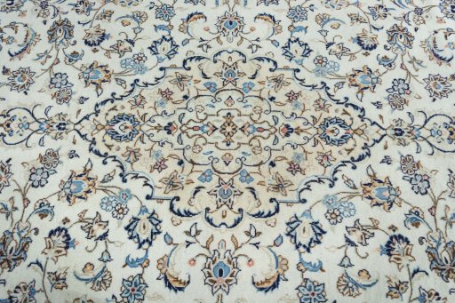 Central medallion detail of 2000s Kashan rug from Iran / Persia