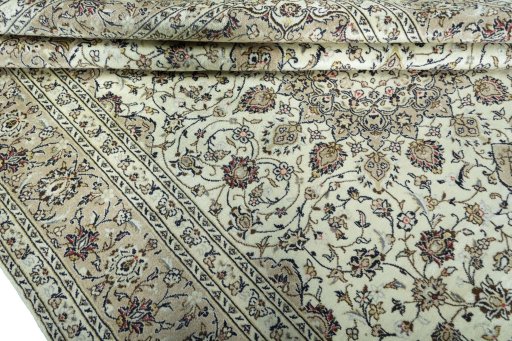 Close-up detail of 2000s Kashan rug from Iran / Persia showing Wool weave