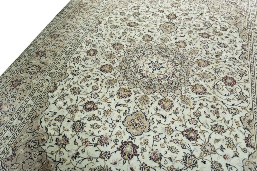 Backside of handmade 2000s Kashan rug showing knot structure and weave density