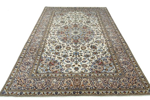 Surface texture of 2000s Kashan rug with natural Wool and intricate pattern