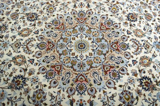 Central medallion detail of 2000s Kashan rug from Iran / Persia