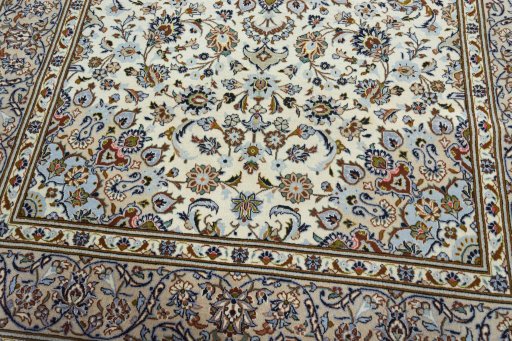 Close-up detail of 2000s Kashan rug from Iran / Persia showing Wool weave