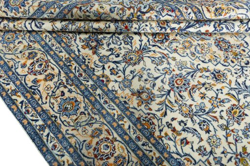 Close-up detail of 2000s Kashan rug from Iran / Persia showing Wool weave