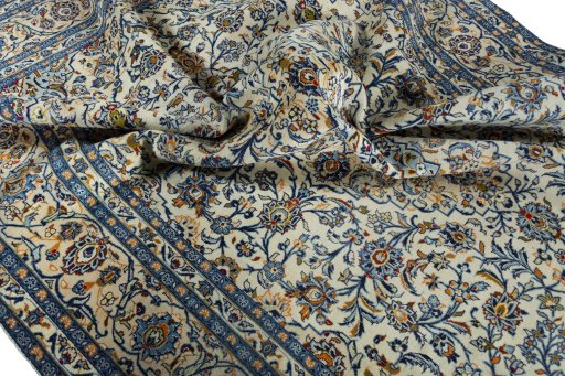 Surface texture of 2000s Kashan rug with natural Wool and intricate pattern