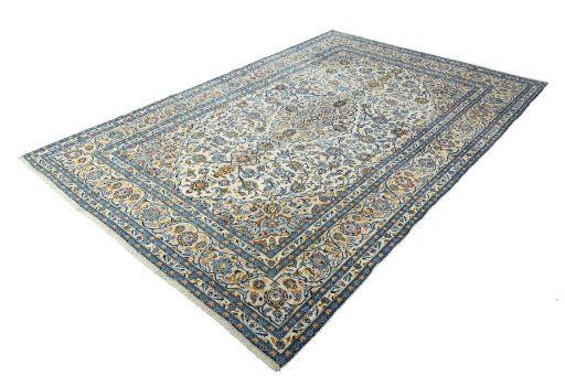 Corner detail of 2000s Kashan rug showing border pattern and Wool pile