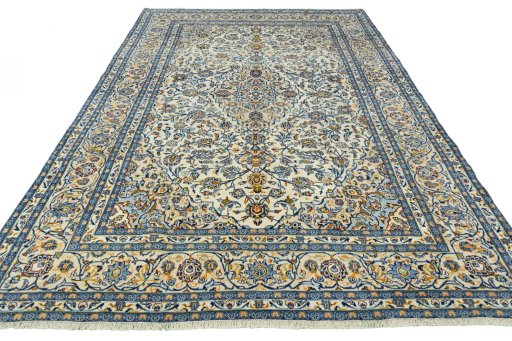 Surface texture of 2000s Kashan rug with natural Wool and intricate pattern