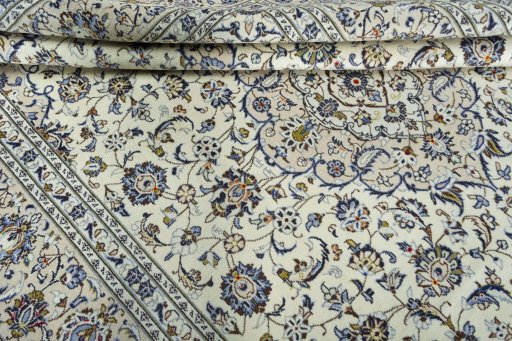 Close-up detail of 2000s Kashan rug from Iran / Persia showing Wool weave
