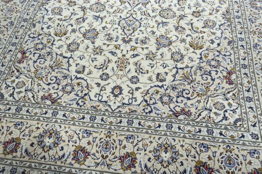 Close-up detail of 2000s Kashan rug from Iran / Persia showing Wool weave