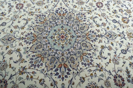 Central medallion detail of 2000s Kashan rug from Iran / Persia
