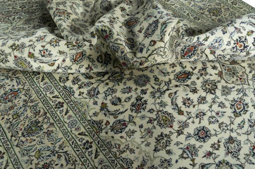 Surface texture of 2000s Kashan rug with natural Wool and intricate pattern