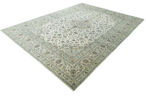 Corner detail of 2000s Kashan rug showing border pattern and Wool pile