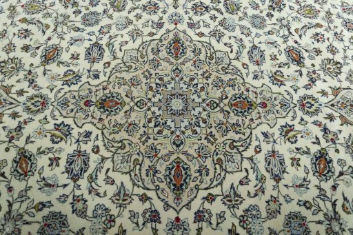 Central medallion detail of 2000s Kashan rug from Iran / Persia