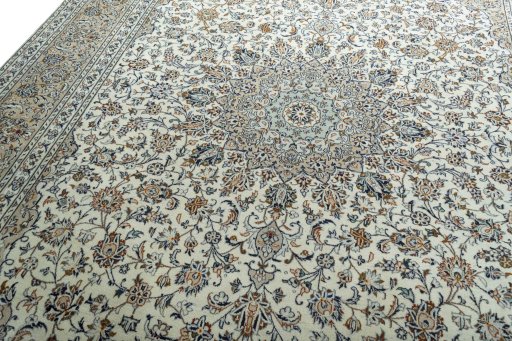 Backside of handmade 2000s Kashan rug showing knot structure and weave density