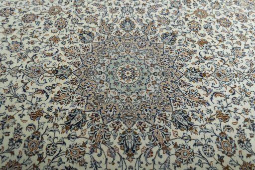 Central medallion detail of 2000s Kashan rug from Iran / Persia