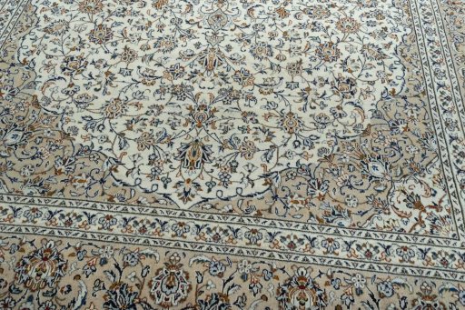 Close-up detail of 2000s Kashan rug from Iran / Persia showing Wool weave