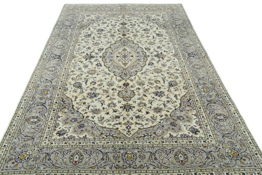 Surface texture of 2000s Kashan rug with natural Wool and intricate pattern
