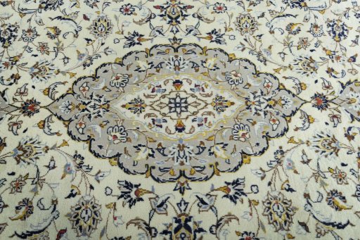 Central medallion detail of 2000s Kashan rug from Iran / Persia