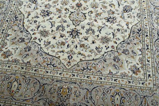 Close-up detail of 2000s Kashan rug from Iran / Persia showing Wool weave