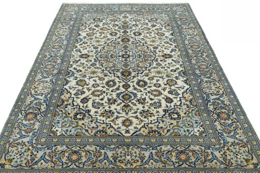 Surface texture of 2000s Kashan rug with natural Wool and intricate pattern