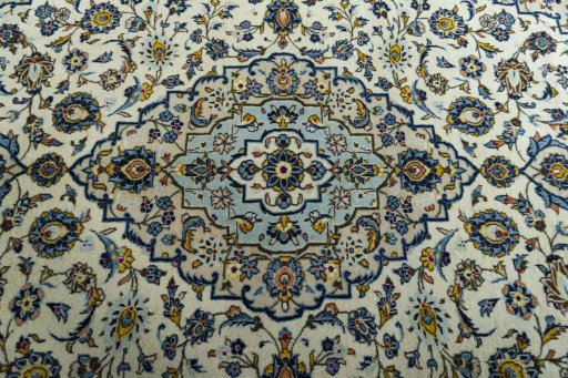 Central medallion detail of 2000s Kashan rug from Iran / Persia