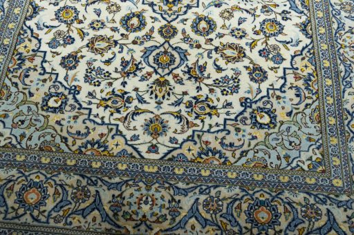 Close-up detail of 2000s Kashan rug from Iran / Persia showing Wool weave