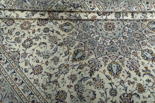 Close-up detail of 2000s Kashan rug from Iran / Persia showing Wool weave