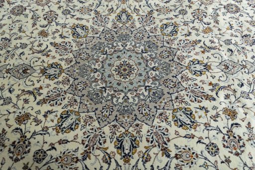 Central medallion detail of 2000s Kashan rug from Iran / Persia