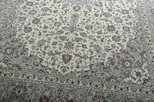Close-up detail of 2000s Kashan rug from Iran / Persia showing Wool weave