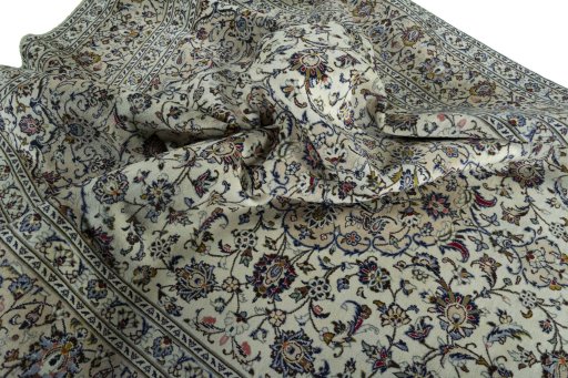 Surface texture of 2000s Kashan rug with natural Wool and intricate pattern