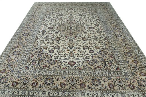 Surface texture of 2000s Kashan rug with natural Wool and intricate pattern