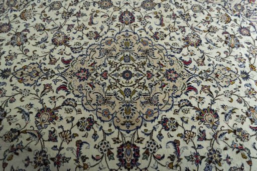 Central medallion detail of 2000s Kashan rug from Iran / Persia