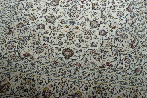 Close-up detail of 2000s Kashan rug from Iran / Persia showing Wool weave