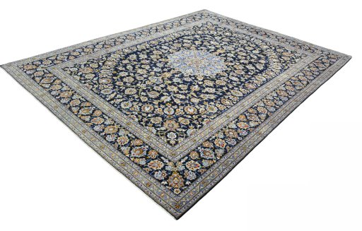 Corner detail of 2000s Kashan rug showing border pattern and Wool pile