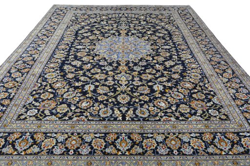 Surface texture of 2000s Kashan rug with natural Wool and intricate pattern
