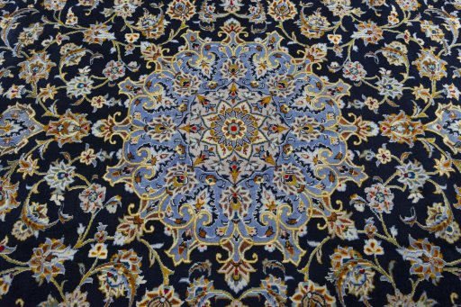Central medallion detail of 2000s Kashan rug from Iran / Persia