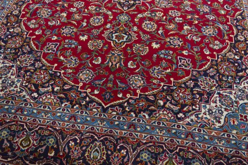 Close-up detail of 2000s Kashan rug from Iran / Persia showing Wool weave