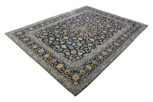 Corner detail of 2000s Kashan rug showing border pattern and Wool pile