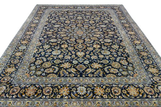 Surface texture of 2000s Kashan rug with natural Wool and intricate pattern