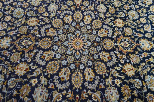 Central medallion detail of 2000s Kashan rug from Iran / Persia